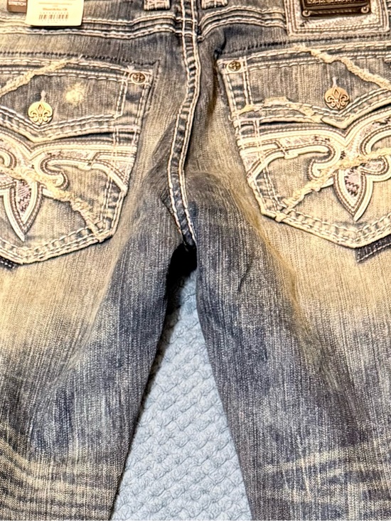 Rock Revival Other - NWT Rock Revival Embroidered Pocket Distressed Jeans in Faded Blue